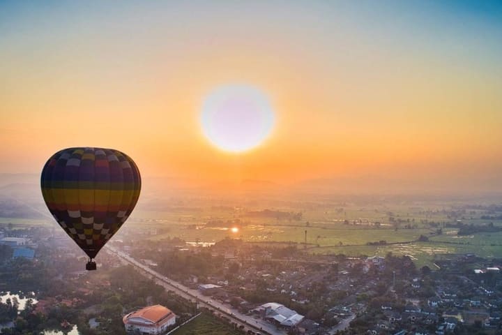 Sunrise Hot Air Balloon Flight with Champagne and Spa Package by Fah Lanna in Chiang Mai