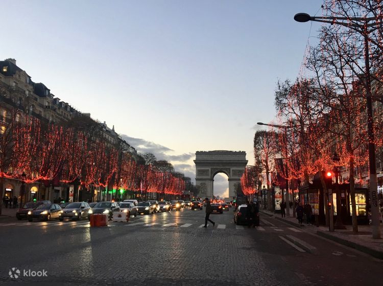 Streetview of famous Champs Elysees with illumination and traffic