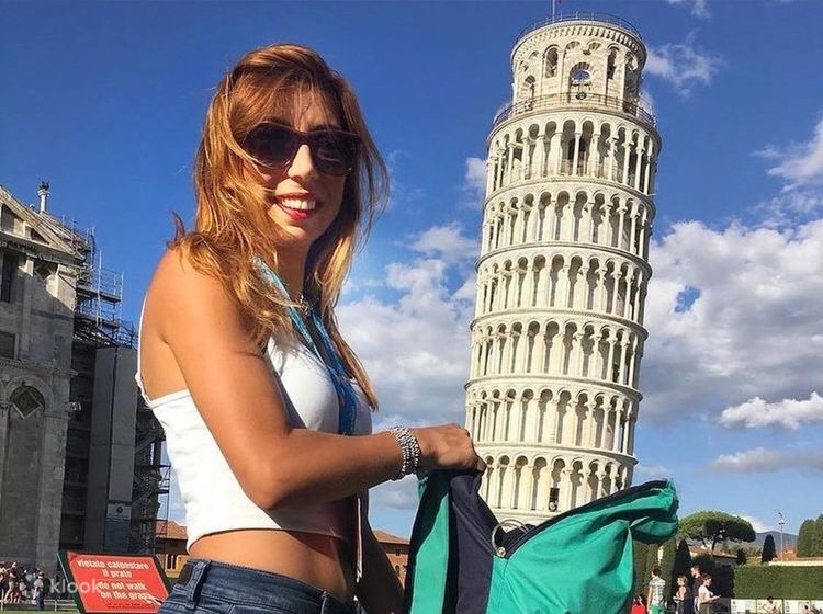 Italy, Tuscany, Pisa, Girl posing by Leaning Tower of Pisa Stock Photo -  Alamy