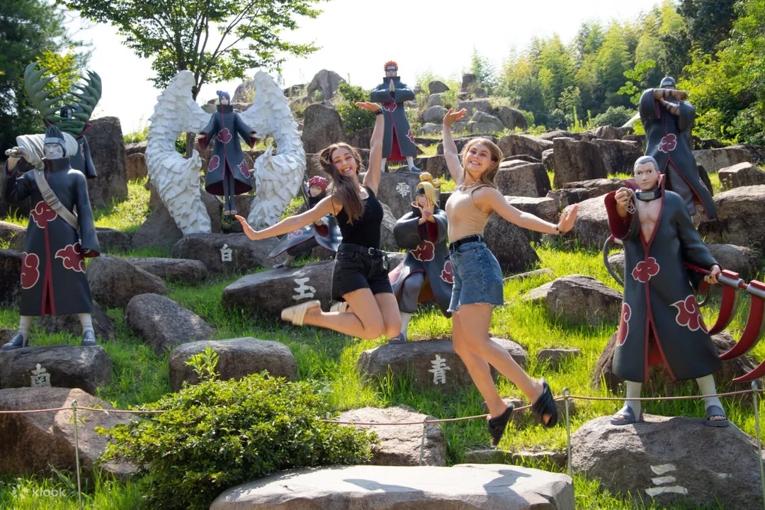 Visitors posing with Akatsuki displays at Shinobi-Zato