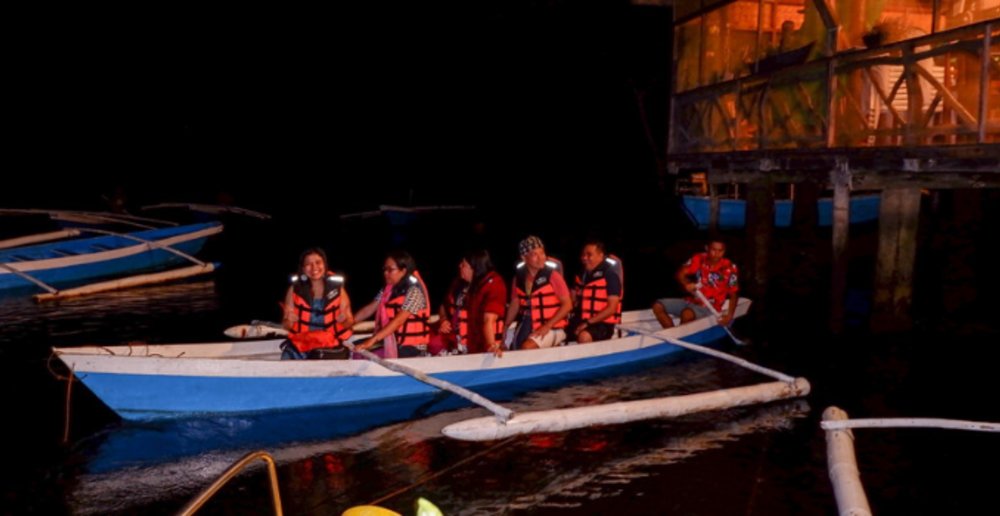 Fisherman use the glow of the fireflies to guide them at night