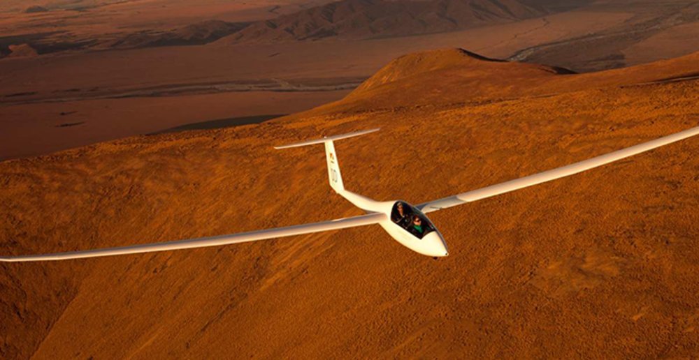Glide around the skies and take in the stunning Omarama Basin views