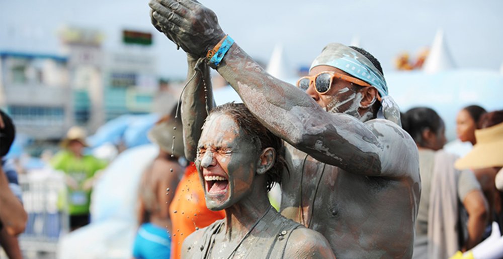 friends pouring mud korea 2020 festival games fun