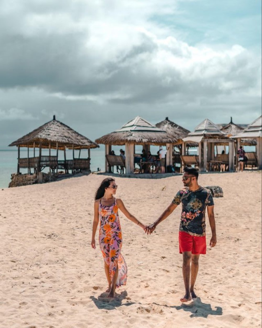 beach hut couple pandanon island philippines sand sea 