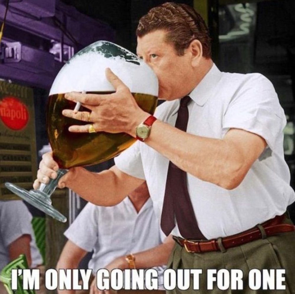 Man drinking large beer