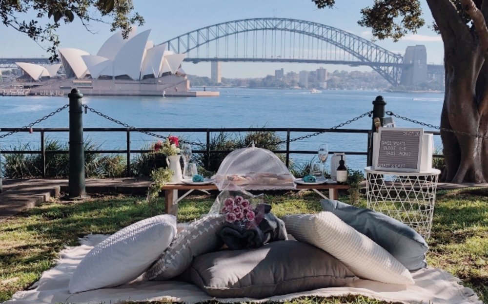 luxe picnic set up by the harbour