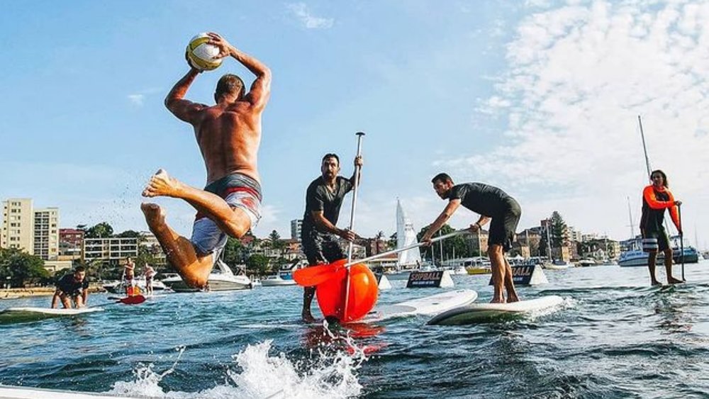 Boost your competitive spirit with a game of SUPBALL. Credits: @stuartsmithphoto