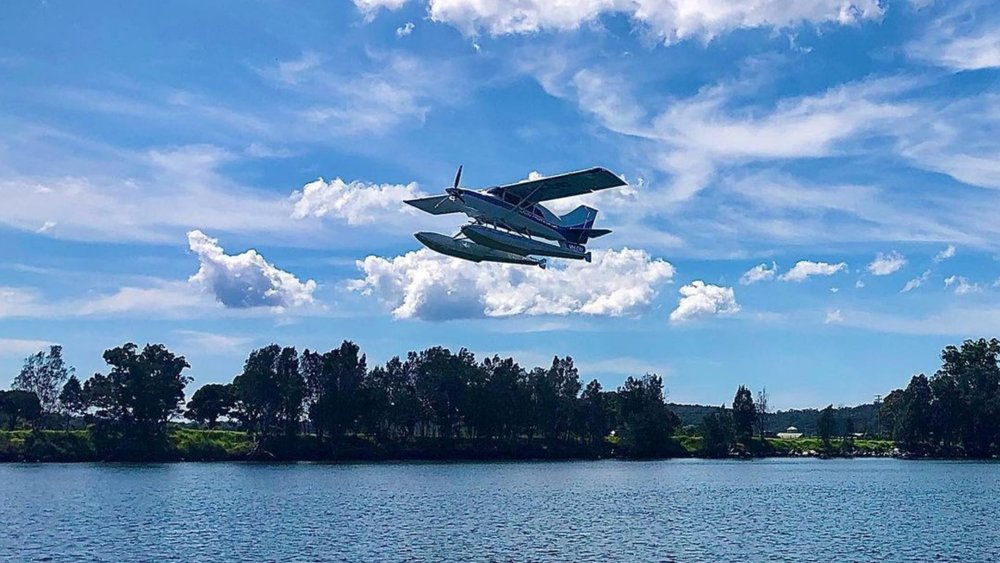 A Seaplane cruising above South Coast’s pristine waters. Credits @southcoastseaplanes on Instagram