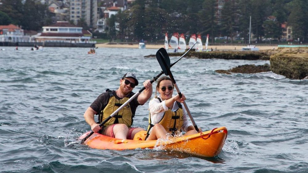 Another tandem enjoyng paddling down the waters of Manly. Image credits: @manly kayak centre on Instagram