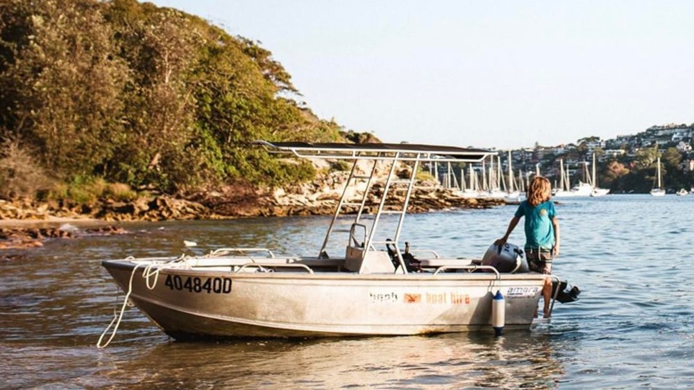One of the small boats you can hire and self-drive around Manly. Image credits: @manlykayakcentre on Instagram