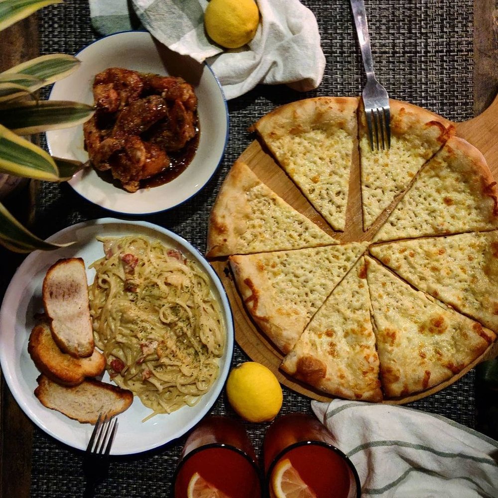 fabios pizza kitchen pizza and pasta dish