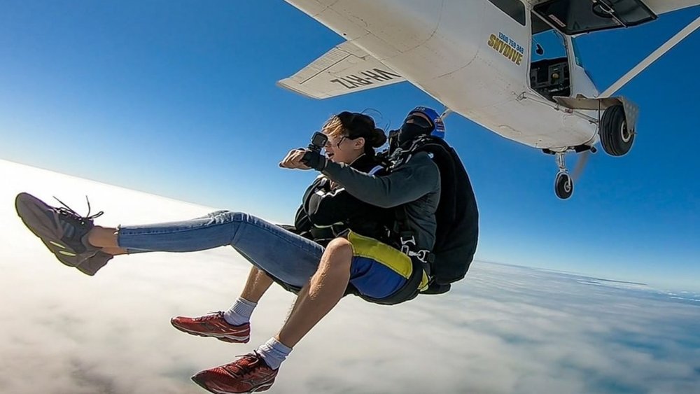 Gather up your courage and take the plunge to see the best view of Whitsundays! Credits: @1300skydiveairliebeach