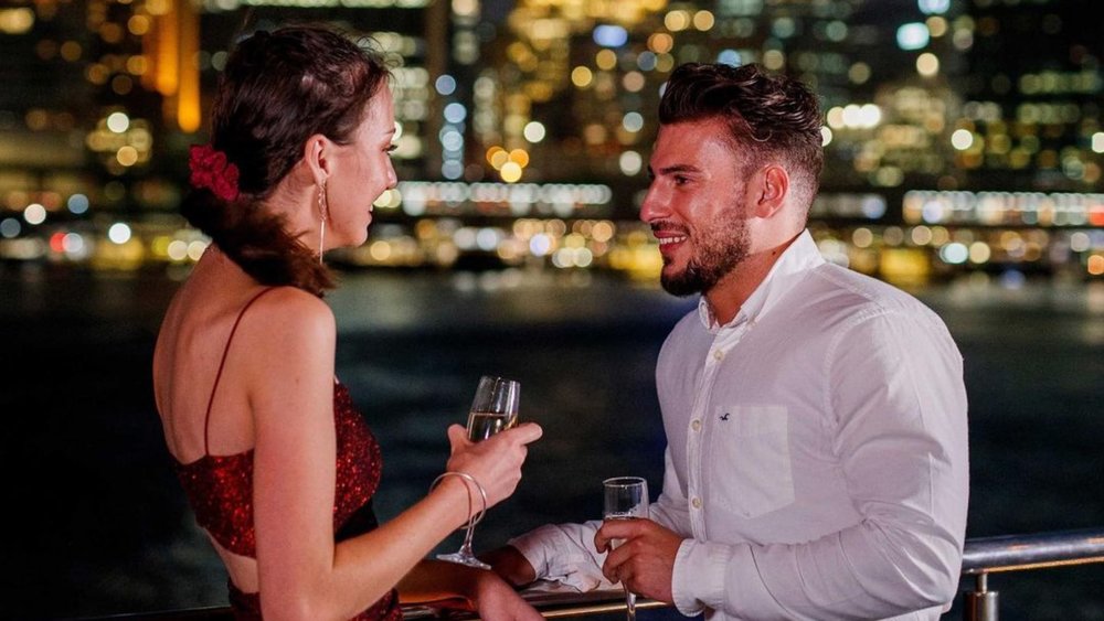 Wine and dine as you cruise by Sydney Harbour for a romantic getaway. Image credits: @captaincookcruises on Instagram