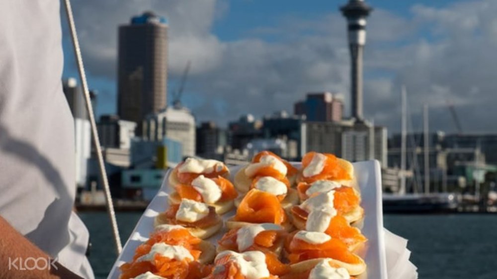 Have some scrumptious food while sailing across the water on the Auckland Harbour Dinner Cruise