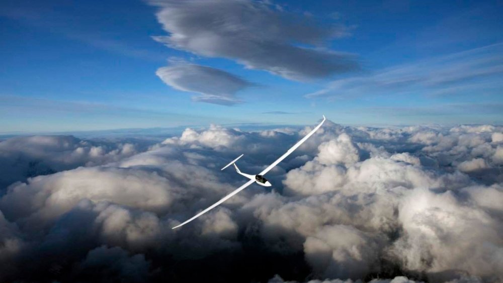 Glide over the spectacular views of New Zealand’s natural wonders!