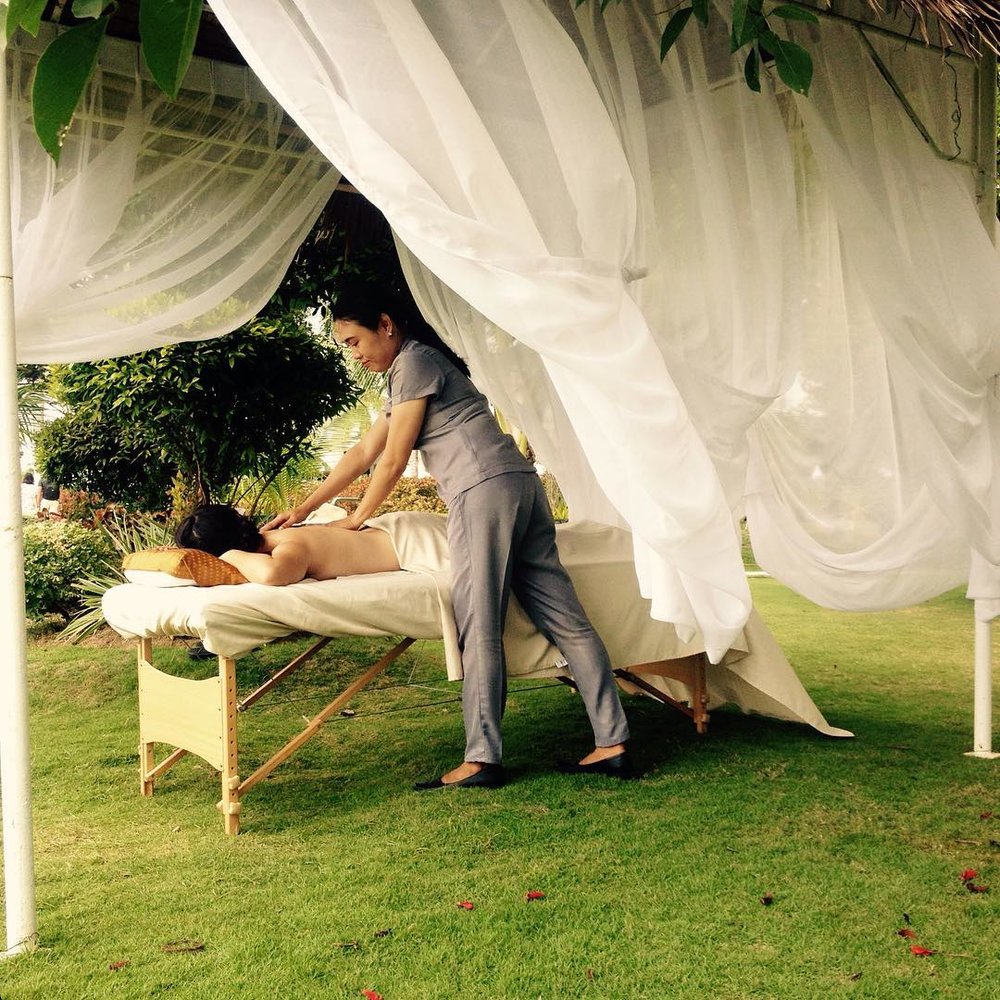 girl enjoying massage service in solea mactan resort