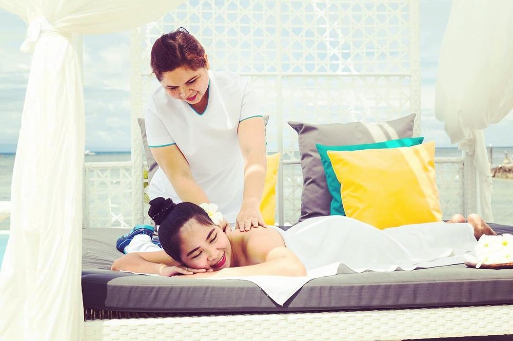 girl enjoying spa service at pacific cebu resort