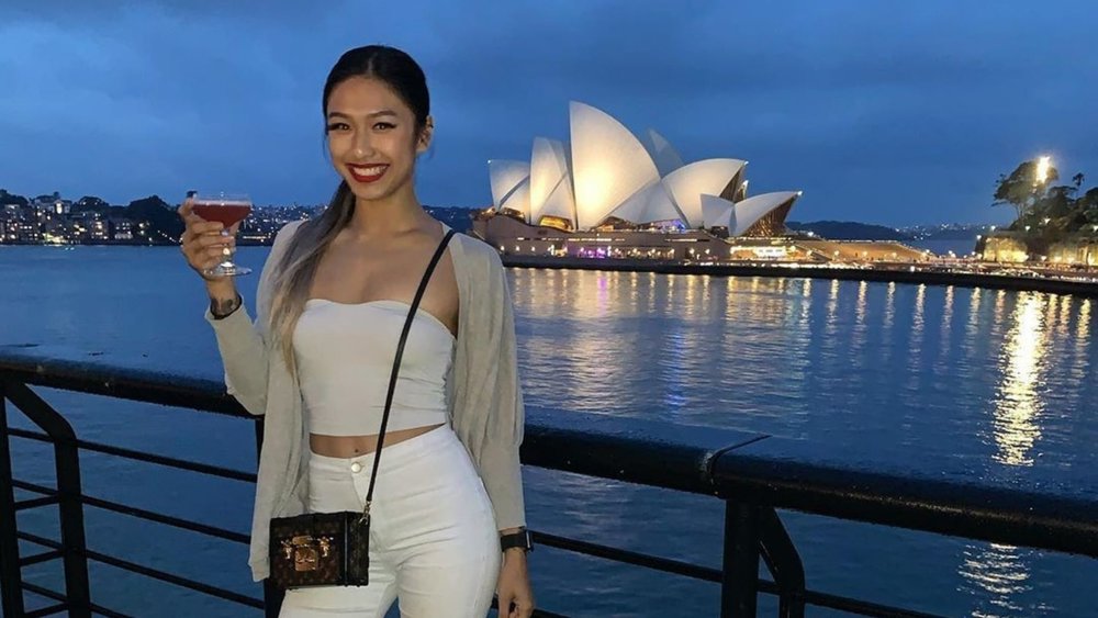 Watch vibrantly lit ships cruise by during Vivid Sydney at Cruise Bar. Image credits: @cruisebarsydney on Instagram