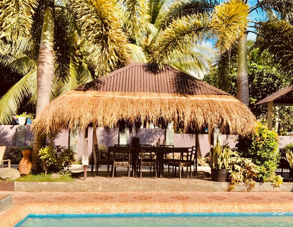 nipa hut beside the pool at casa marqueza