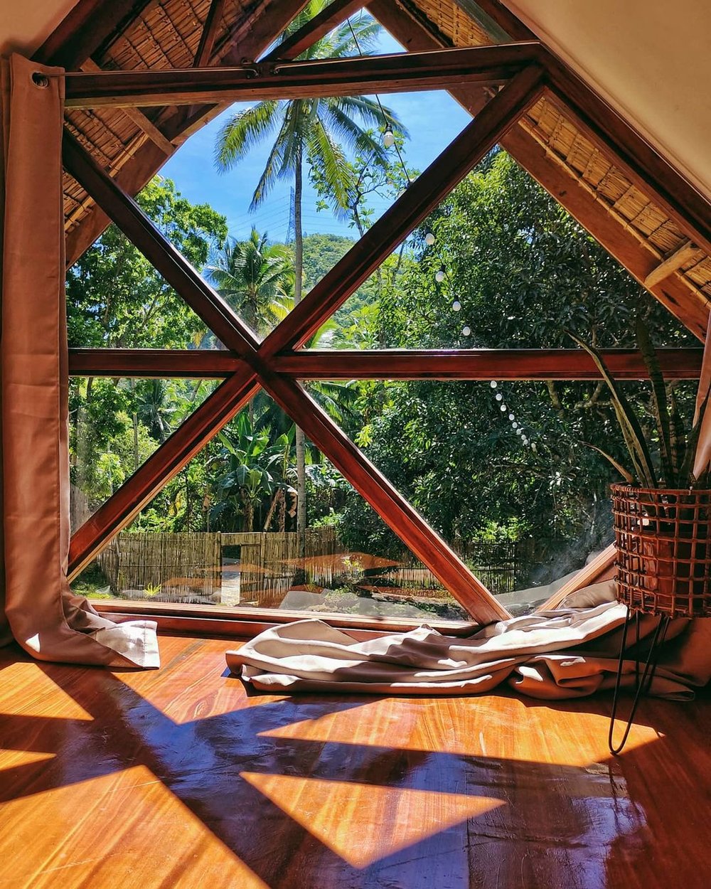 overlooking window on the second floor of areca palm hut