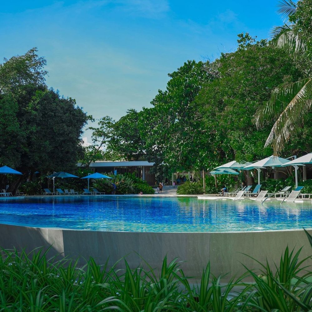 swimming pool at tambuli seaside resort and spa