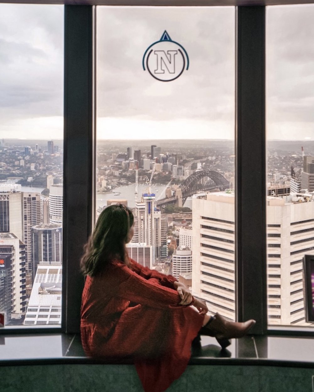 Basking in the view of the city atop the Sydney Tower Eye