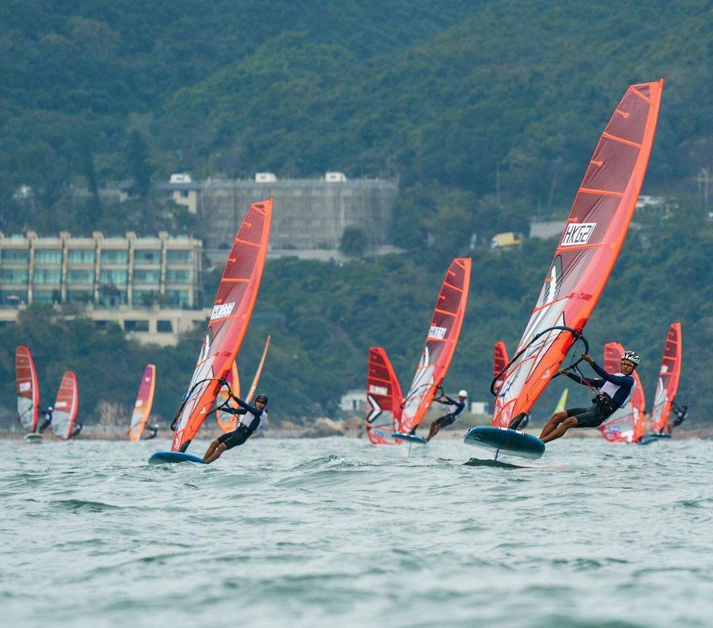 men windsurfing in hong kong