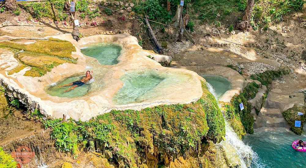 man in a pool at Ka Treasure Water Terraces