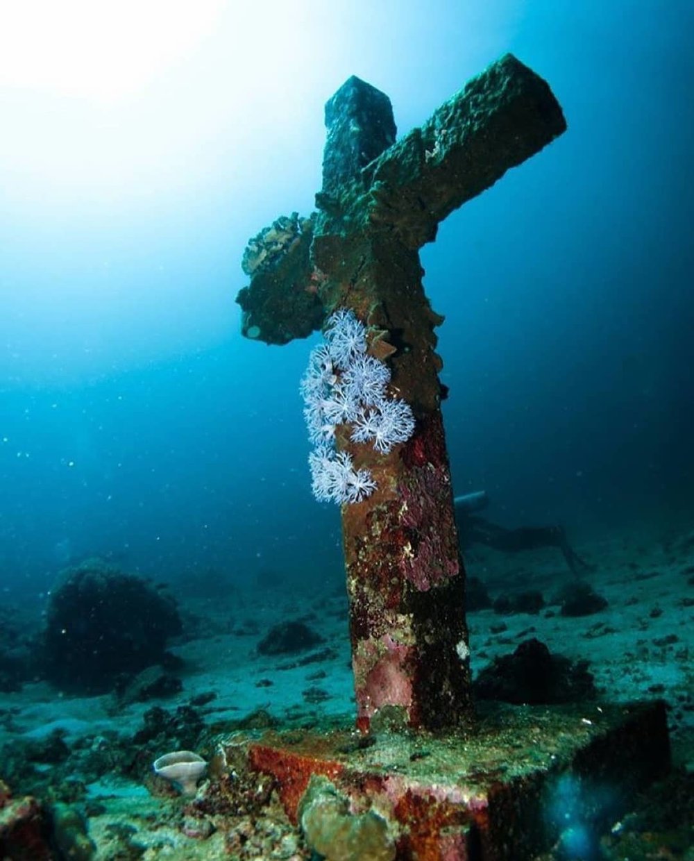 cross underwater in diving spot in the philippines