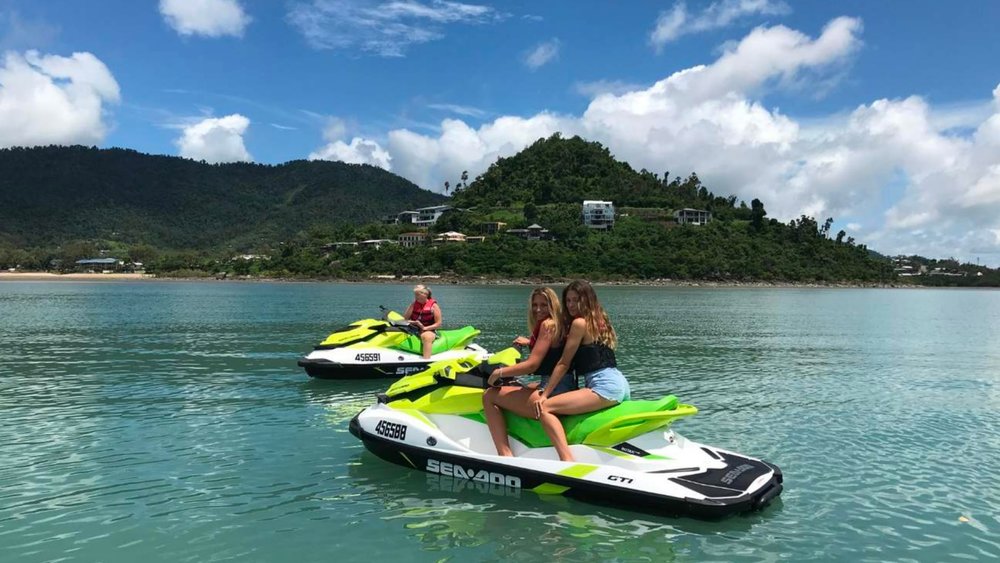 Exploring the waters of Airlie on jet skis is the way to go!