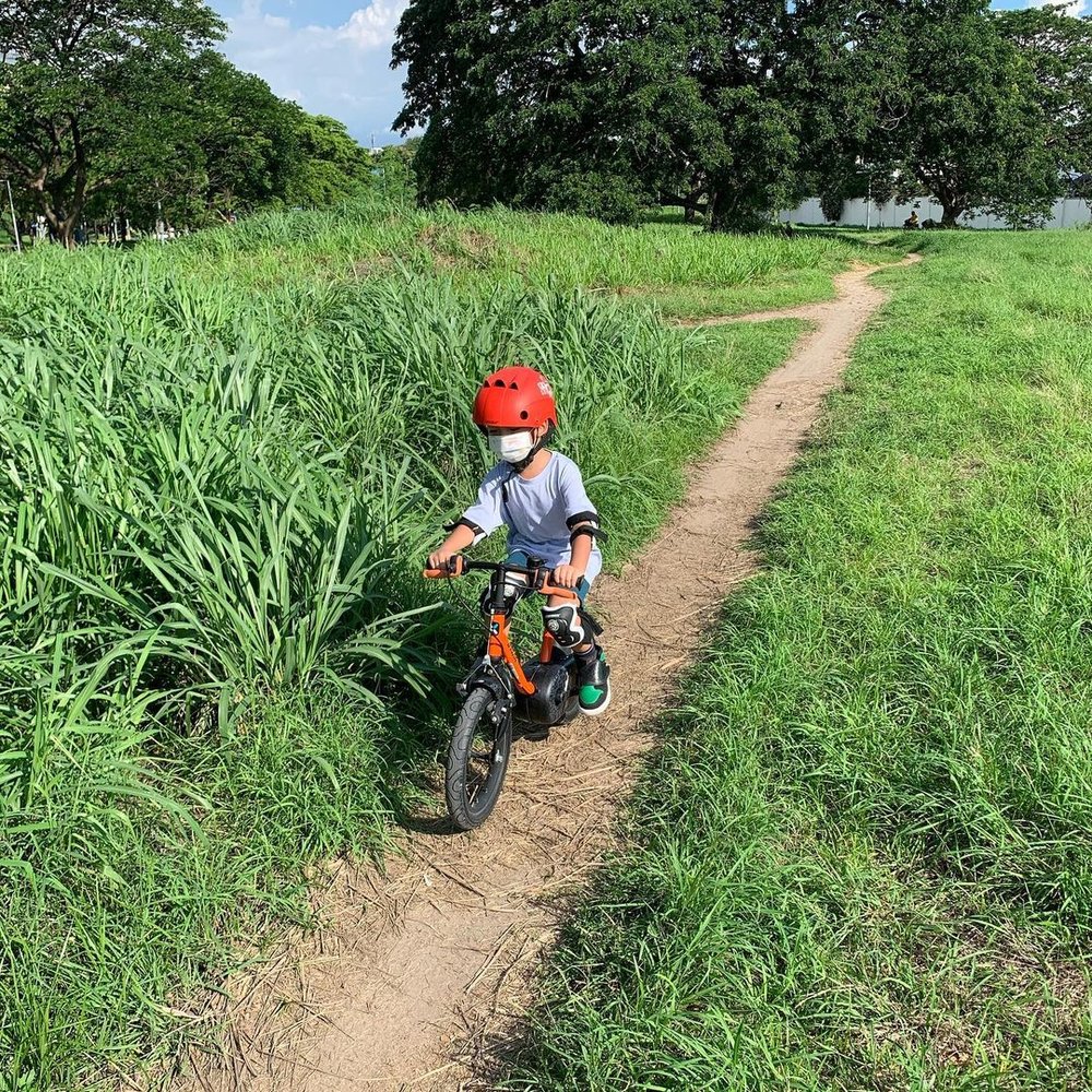a kid biking at filinvest mbt trail