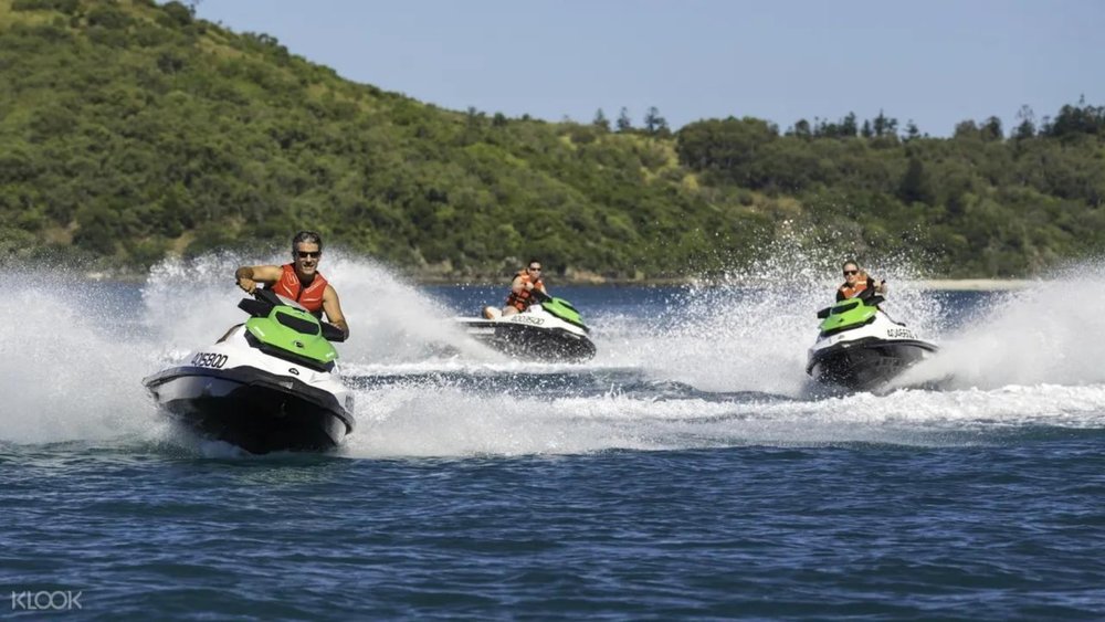 Feel the thrill of zooming past the water on a jet ski!