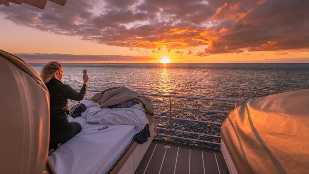 Sip on sunset drinks in this reefsleep experience! Credits: @cruisewhitsundays