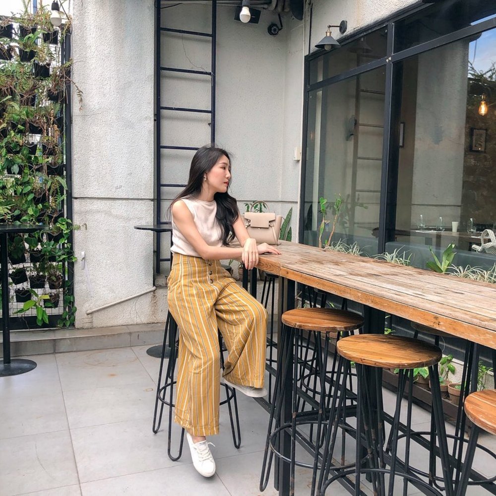 Girl seated in Ikomai