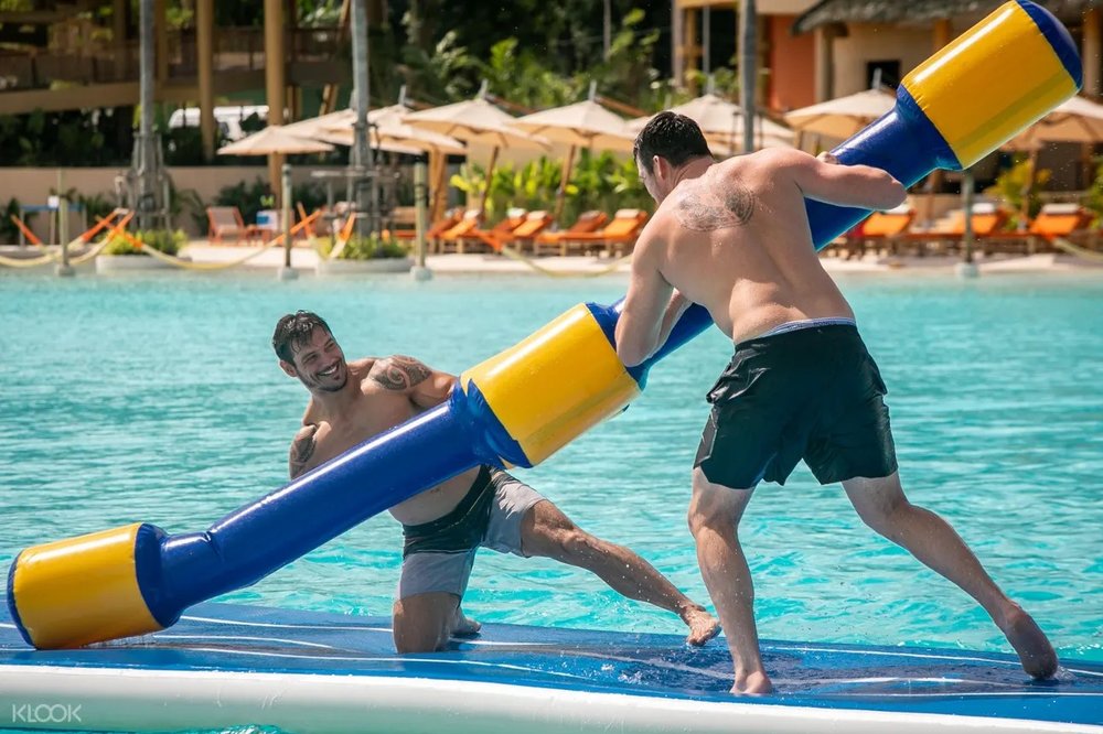 two men playing on the pool
