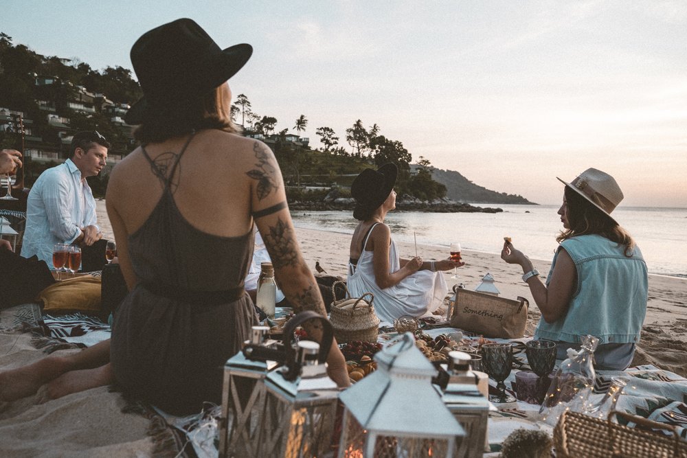 people on kata noi beach in phuket
