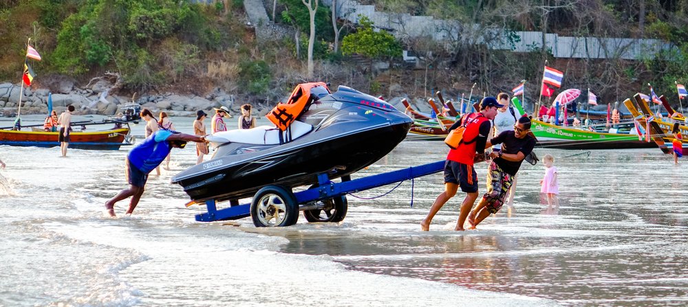 jet ski being dragged on a beach in phuket