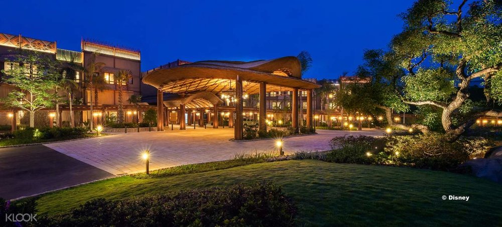 disney explorers lodge main building at night