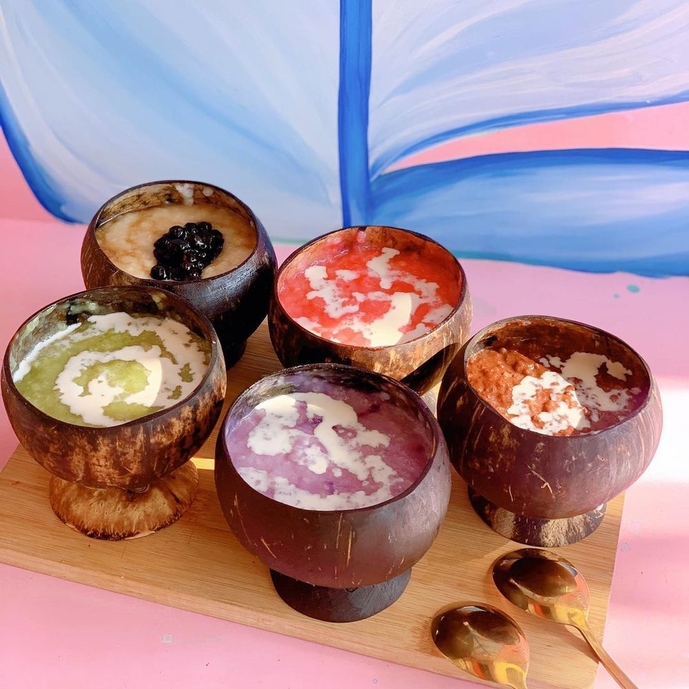 colorful drinks in coconut husks at worth cafe in laguna