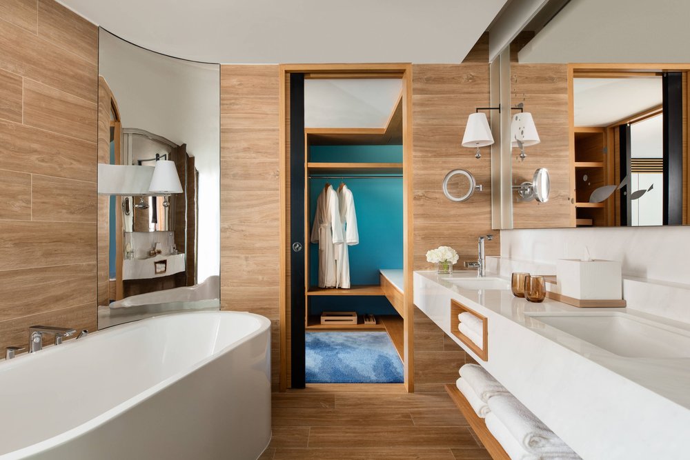 bathtub and closet in suite bathroom at ocean park marriott hotel