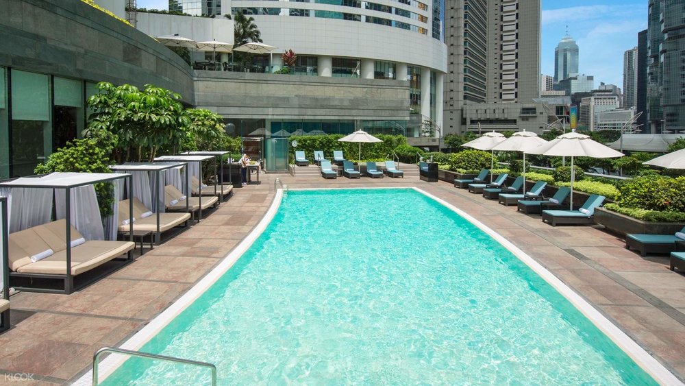 Outdoor Pool at Conrad Hong Kong overlooking city
