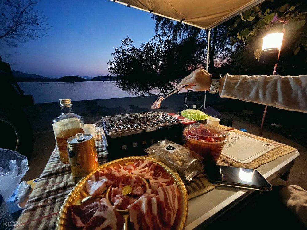 korean bbq camping with grill at camping site in hong kong