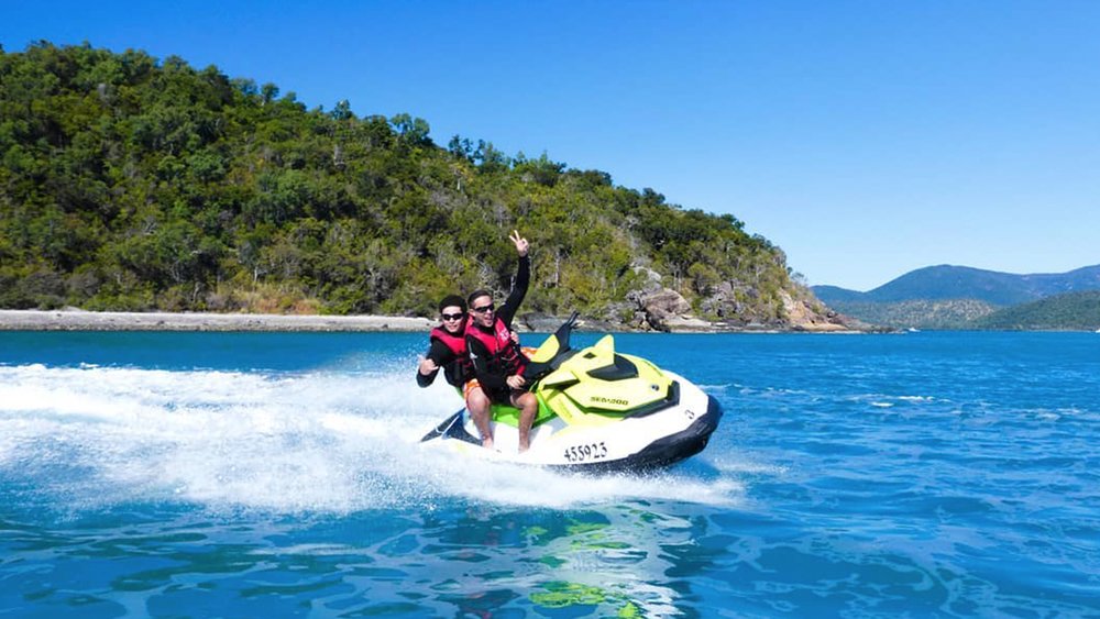 Go on an exhilarating jet ski ride with your mate around Airlie Beach. Image credits: @whitsundayjetskitours on Instagram