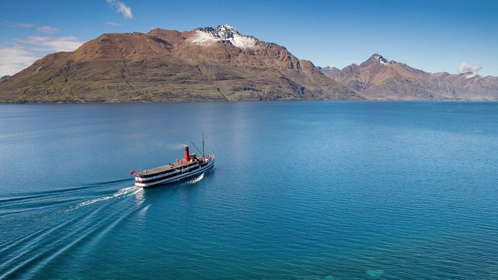 Take in the views of crystal clear blue waters on the way to Walter Peak Station. Credit: @realjourneys