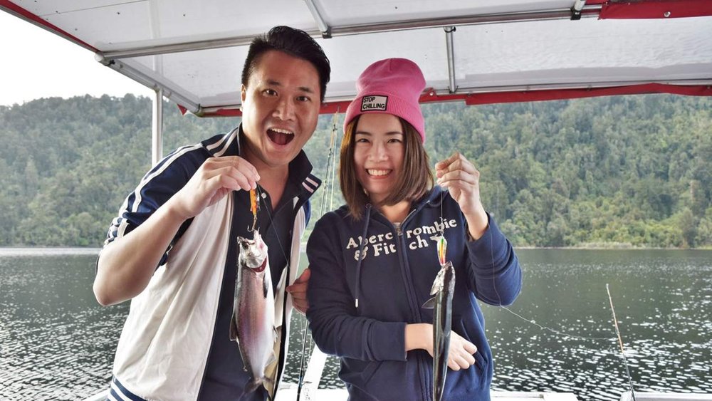 Show off your haul after a fun fishing experience at the lake!