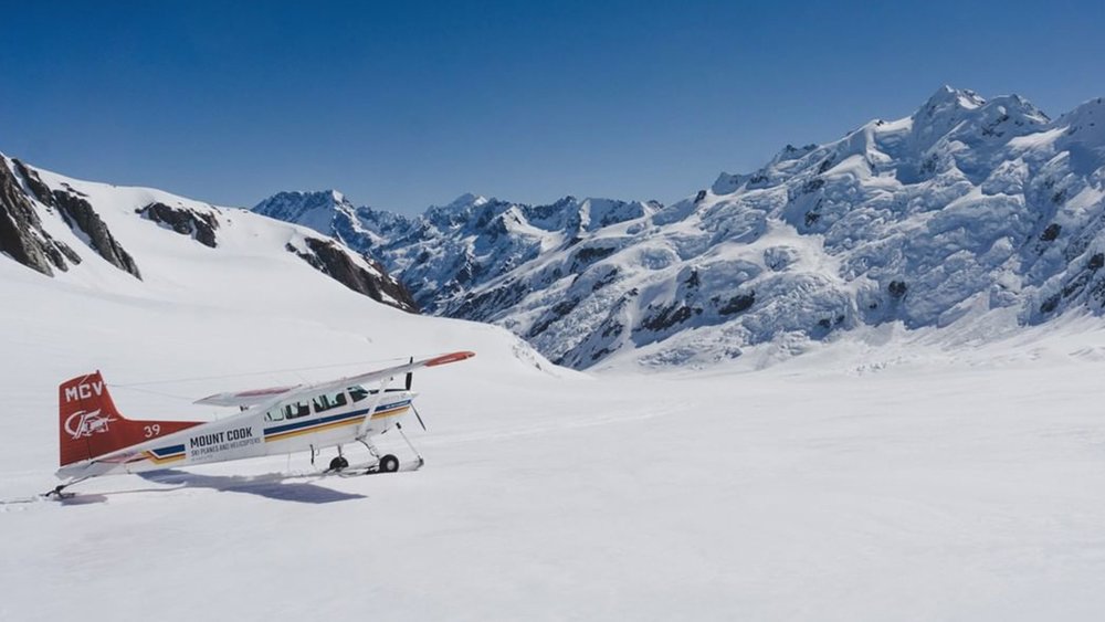 Snow-capped peaks and powdery snow make for an unforgettable picnic. Image credit: @inflite.nz on Instagram