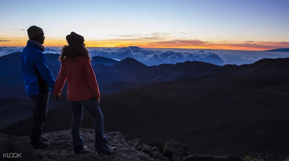 couple enjoying the sunrise at Haleakala Sunrise in Maui