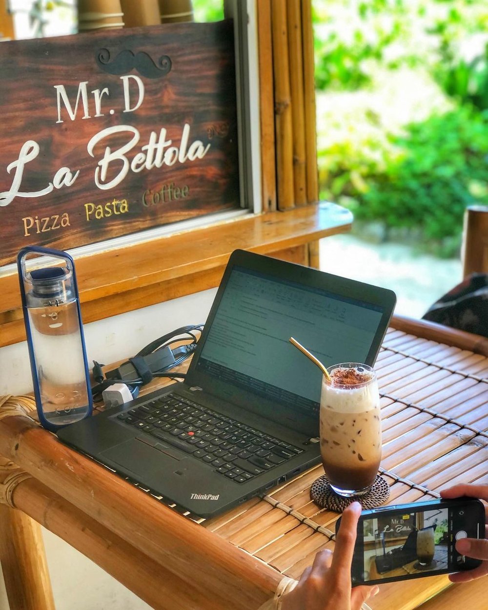 laptop and coffee in boracay cafe