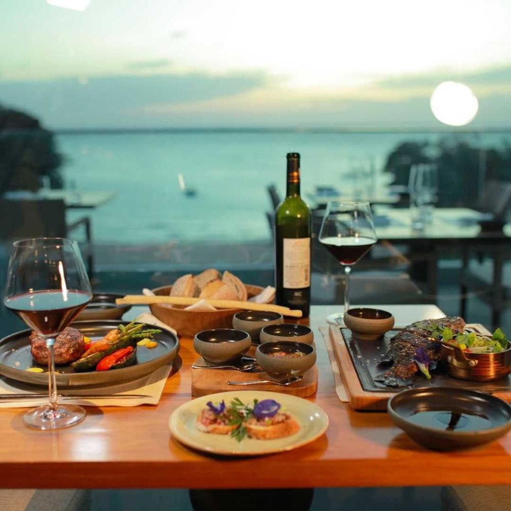 wine and food with beachfront view at crimson boracay