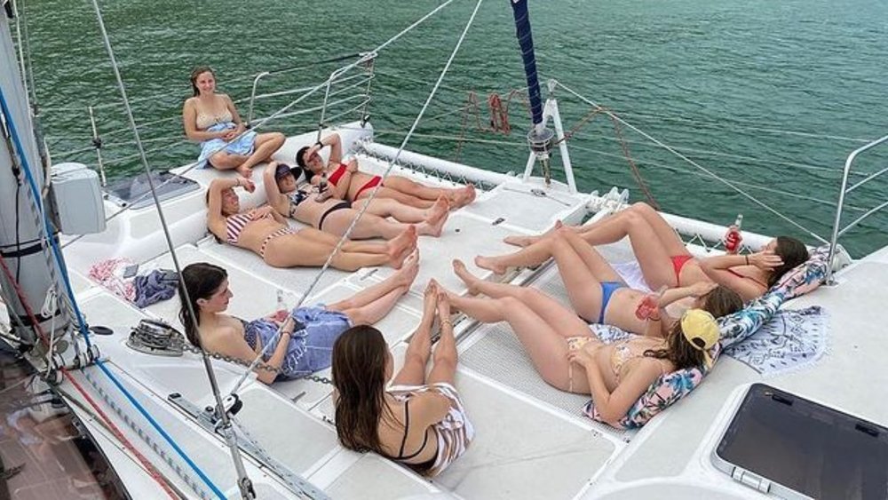 Live it up by partying on a luxury catamaran! Image credits: @champagne_sailing on Instagram